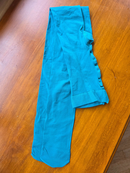 Bright turquoise kids’ tights