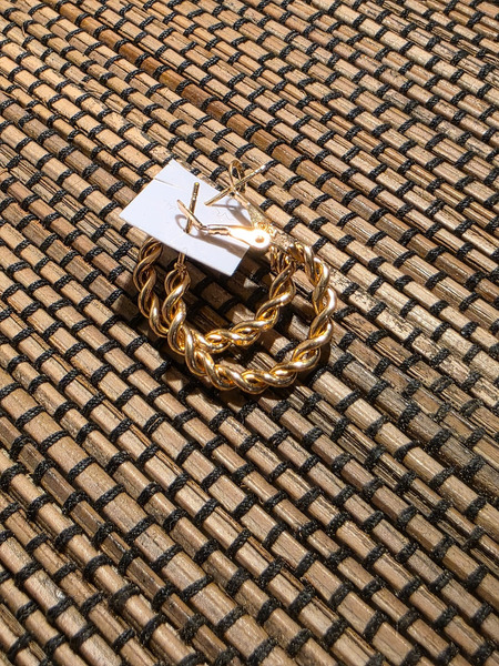 Twisted golden hoop earrings
